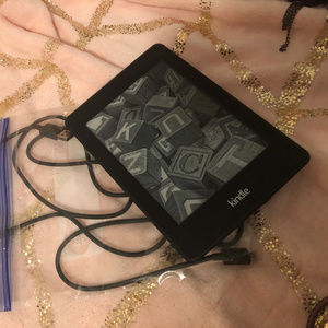 KINDLE PAPERWEIGHT E READER